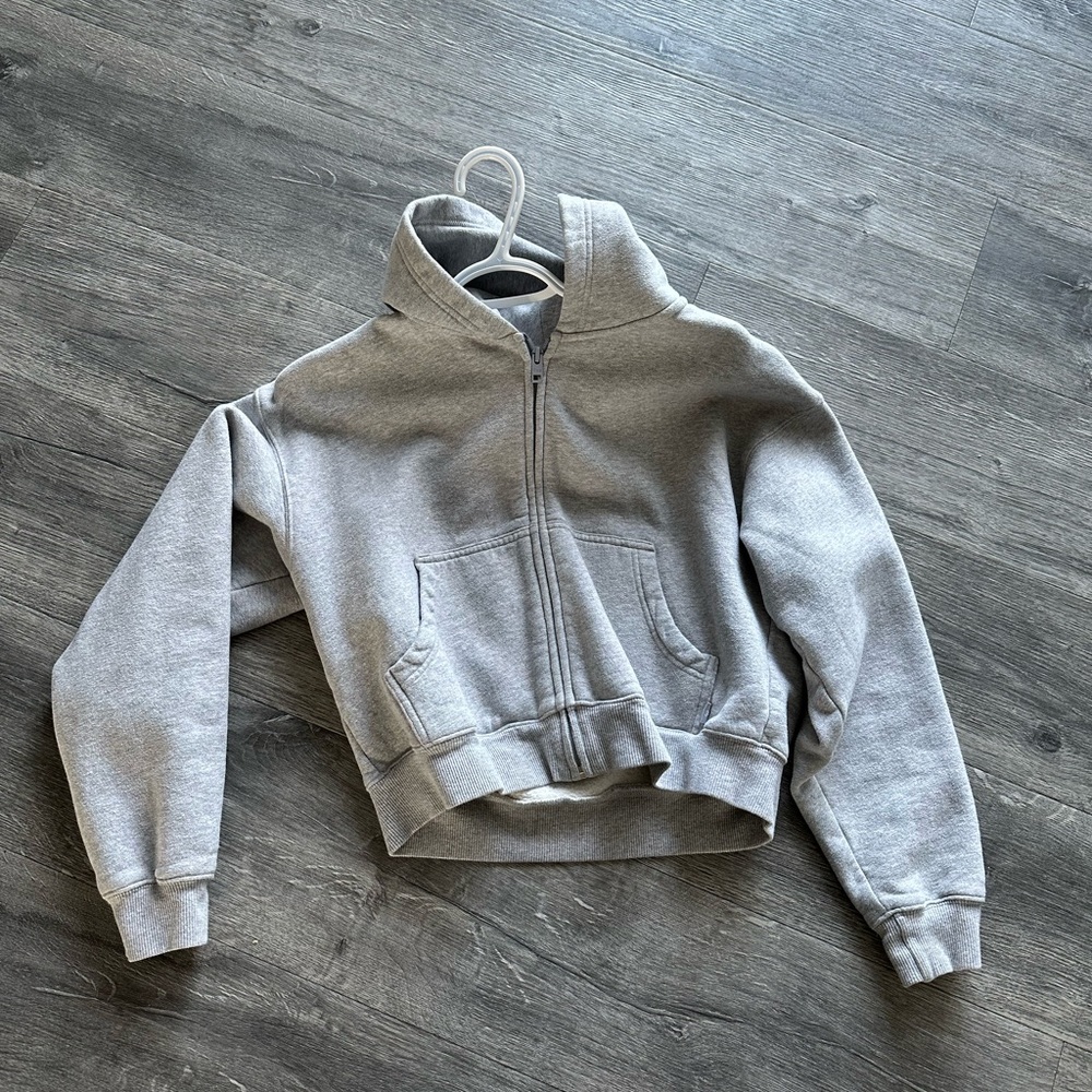 TNA crop zip up
